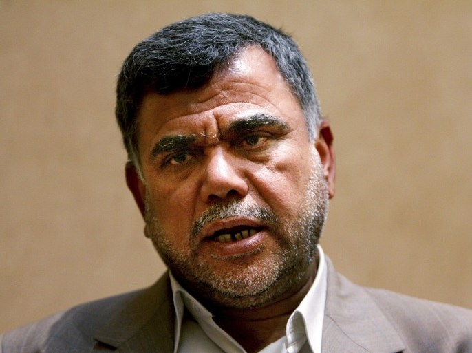 Hadi al-Ameri, the leader of Iraq's Badr Brigade, a Shi'ite militia, speaks during an interview in Baghdad in this June 28, 2005 file photo. To match Special Report MIDEAST-CRISIS/MILITIAS REUTERS/Faleh Kheiber/Files (IRAQ - Tags: HEADSHOT POLITICS CIVIL UNREST MILITARY)
