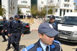 Moroccan police secures the departure of a van believed to carry part of a 13-members strong group of an alleged terrorist cell after they were questioned by a prosecutor at a court in Rabat, Morocco, 02 April 2015. Moroccan authorities in March had broken up a cell of jihadist militants whom they suspect to have intended to carry out attacks in the name of the Islamic State extremist group. The 13 suspects were arrested in operations in Casablanca, Tangiers, Marrakesh and elsewhere in the country, Abdelhak Khiam, director of the Central Office of Judicial Investigations, had said after their arrest.