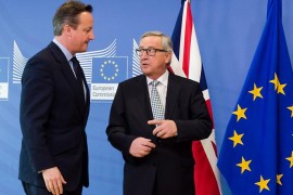 British Prime Minister David Cameron, left, is greeted by European Commission President Jean-Claude Juncker at EU headquarters in Brussels on Tuesday, Feb. 16, 2016. David Cameron is visiting EU leaders two days ahead of a crucial EU summit. (AP Photo/Geert Vanden Wijngaert)