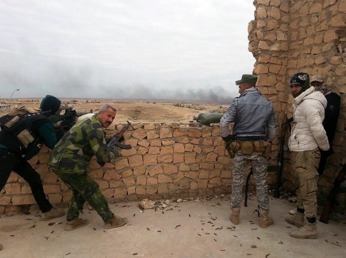 Iraqi security forces and allied Sunni tribal fighters defend their position against Islamic State group militants in Anbar province, 70 miles (115 kilometers) west of Baghdad, Sunday, Jan. 3, 2016. The Islamic State group has continued to launch a series of deadly attacks against Iraqi government forces on the edges of the western city of Ramadi, days after they were driven out of the city center. (AP Photo)