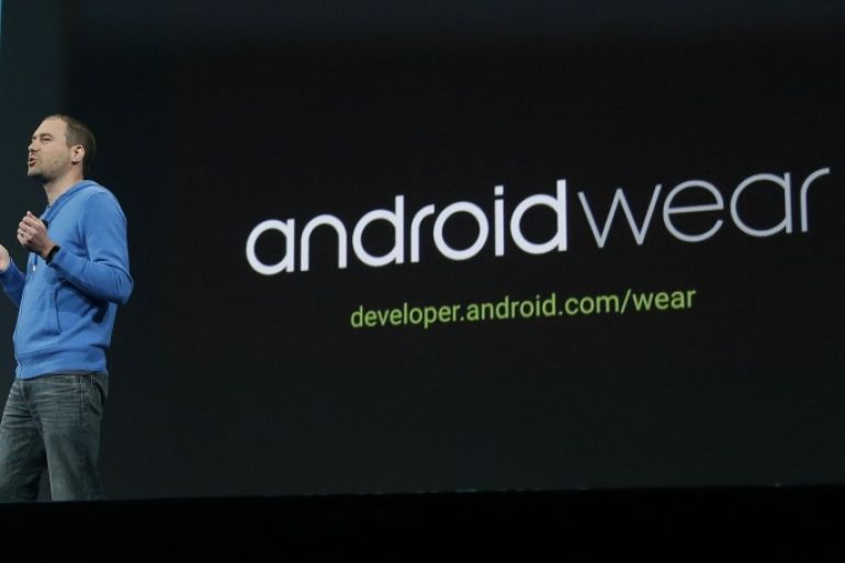David Singleton, Android director of engineering, speaks about Android Wear at the Google I/O 2014 keynote presentation in San Francisco, Wednesday, June 25, 2014. As the Internet giant's Android operating system stretches into cars, homes and smartwatches, this year's annual confab will expand on its usual focus on smartphones and tablets. (AP Photo/Jeff Chiu)