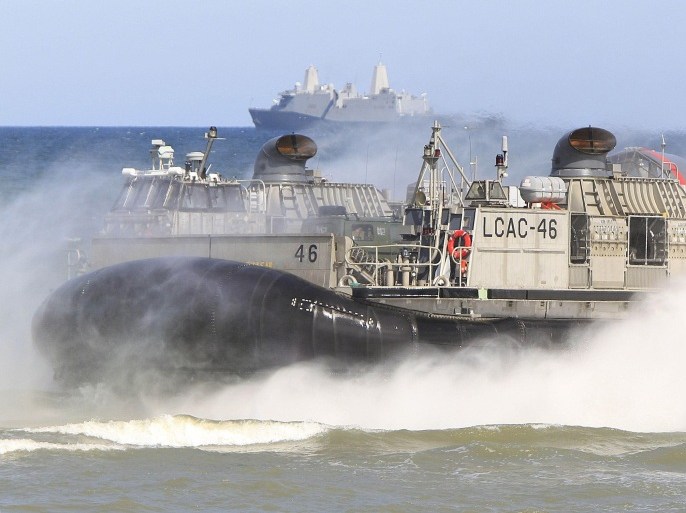FILE - In this June 17, 2015 file photo an air-cushion vehicle goes toward the beach as NATO troops participate in the NATO sea exercises BALTOPS 2015 that are to reassure the Baltic Sea region allies in the face of a resurgent Russia, in Ustka, Poland. Poland said Wednesday Feb. 3, 2016 it welcomes a U.S. plan to quadruple military spending in Europe in reaction to Russia’s military resurgence, yet the tone from several governments appears guarded as it remains unclear how much of the spending will translate into a real and lasting presence of troops and weapons on NATO’s nervous eastern flank. (AP Photo/Czarek Sokolowski,file)