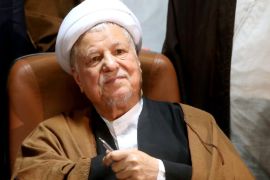FILE - In this Monday, Dec. 31, 2015 file photo, former Iranian President Akbar Hashemi Rafsanjani, who is also a member of the Experts Assembly, attends interior ministry to register his candidacy for the Feb. 26 elections of the assembly in Tehran, Iran. (AP Photo/Ebrahim Noroozi, File)