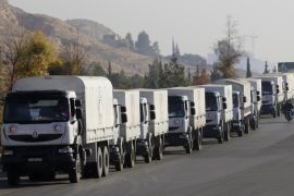 A convoy of trucks loaded with humanitarian supplies are seen heading to the besieged town of Madaya, some 24 kilometers in southwest Damascus, Syria, on Thursday, Jan. 14, 2016 for distribution as part of a large-scale U.N.-sponsored aid operation in the war-ravaged country. (AP Photo)
