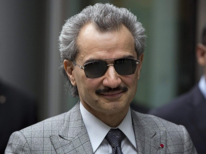 Prince Alwaleed bin Talal is seen leaving the High Court in London in this July 2, 2013 file photograph. REUTERS/Neil Hall/Files