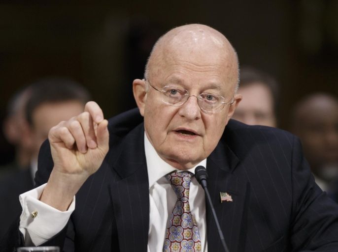 FILE - In this Feb. 26, 2015 file photo, Director of National Intelligence James Clapper testifies on Capitol Hill in Washington. The Obama administration is announcing a new intelligence-sharing arrangement with France to more readily and quickly share military planning regarding the campaign against the Islamic State. After President Barack Obama announced the arrangement to reporters in Turkey, the Pentagon says Defense Secretary Ash Carter and Director of National Intelligence James Clapper have authorized military personnel to share information quickly with their French counterparts. (AP Photo/J. Scott Applewhite, File)