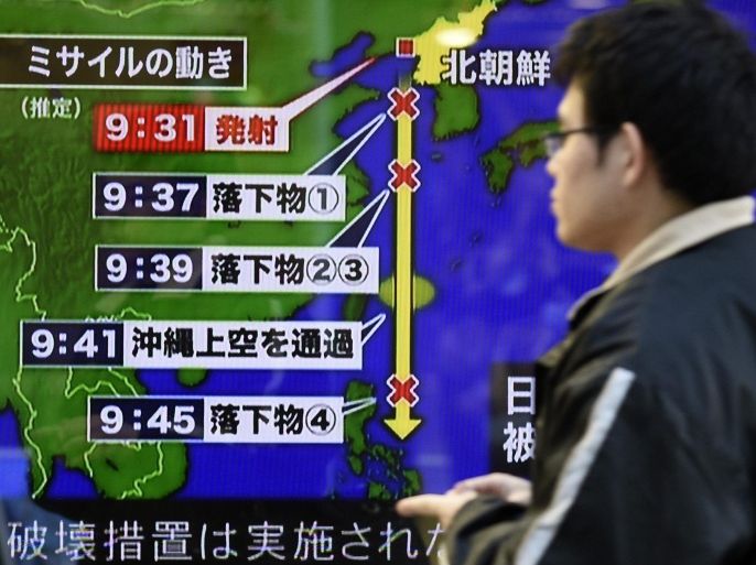 A pedestrian walks past a TV screen broadcasting news of North Korea's launch of a long-range ballistic missile in Tokyo, Japan, 07 February 2016. North Korea launched a long-range ballistic missile from a facility in north-western North Korea. North Korea said its intention was to put a satellite into orbit, but the US and its allies, South Korea and Japan, believe it was a cover for a test of a ballistic missile that could carry a nuclear warhead. Japanese Prime Minister Shinzo Abe called the launch 'absolutely unacceptable.'