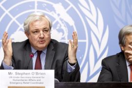 Stephen O'Brien, left, UN under-secretary-general for Humanitarian Affairs, sits next to United Nations High Commissioner for Refugees, UNHCR, Portuguese Antonio Guterres, right, during a press conference, at the European headquarters of the United Nations in Geneva, Switzerland, Monday, Dec. 7, 2015. After a dismal 2015 of mass refugee flows, war and catastrophe, leading U.N. agencies and their partners announced Monday that they are seeking over $20 billion in funding next year — the largest humanitarian appeal in history. (Salvatore Di Nolfi/Keystone via AP)