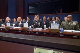 From left, FBI Director James Comey, CIA Director John Brennan, Director of National Intelligence James Clapper, Director of the National Security Agency Adm. Michael Rodgers, and Defense Intelligence Agency Director Lt. Gen. Vincent Stewart, appear on Capitol Hill in Washington, Thursday, Sept. 10, 2015, before the House Intelligence Committee hearing on cyber threats. (AP Photo/Pablo Martinez Monsivais)