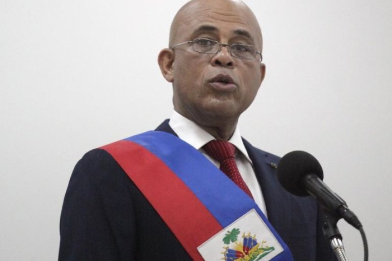 Haiti's outgoing President Michel Martelly speaks during his speech at a ceremony marking the end of his presidential term, in the Haitian Parliament in Port-au-Prince, Haiti, February 7, 2016. REUTERS/Andres Martinez Casares