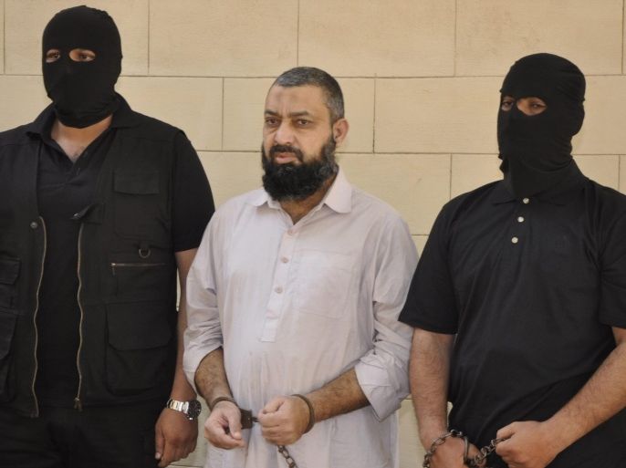 Pakistani security officials show one of the three high profile militants, Naeem Bokhari allegedly belonging to a joint terrorist network of al-Qaeda in the Indian Sub-Continent, Lashkar-e-Jhangvi and Tehreek-e-Taliban, in Karachi, Pakistan, 12 February 2015. Pakistan's Army spokesman Lt Gen Asim Saleem Bajwa said that the suspects were involved in several major attacks in the southern port city of Karachi and elsewhere, and planned to killed 35-40 hostages and break about 100 inmates out of a prison. They also aimed to free Omar Saeed Sheikh, an inmate convicted in the 2002 kidnapping and murder of Wall Street Journal reporter Pearl. He is appealing his death sentence.