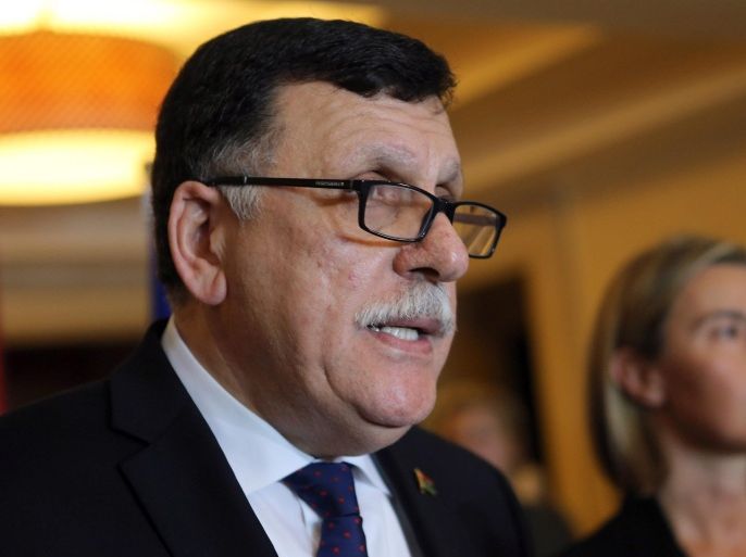 Libyan Prime Minister Fayez Sarraj (L) speaks during a press conference with High Representative of the European Union for Foreign Affairs and Security Policy Federica Mogherini (R) after their meeting in Tunis, Tunisia, 08 January 2016. Mogherini is meeting in Tunis with Sarraj and members of the Libyan Presidency Council to discuss ways to support Libya after signing a peace agreement among warring factions in the country.