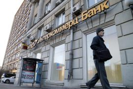 A man walks in front of an office of the Intercommerz bank in Moscow, Russia, 08 February 2016. The Central Bank of Russia has withdrawn the license to conduct banking operations from the Intercommerz bank on 8 February.
