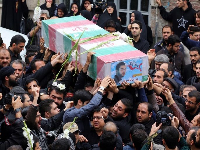 Iranians carry the coffin of member of Iranian revolutionary guards Abdollah Bagheri who was killed in the Syria fighting, during the funeral ceremony in Tehran, Iran, 29 October 2015. Reports said Bagheri, who was a bodyguard of former president Mahmoud Ahmadinejad, was killed in Syria last week during fighting with Islamic State (IS) militants near Aleppo.