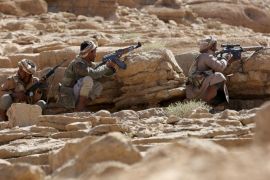 Pro-government tribal fighters take positions as they secure the Furdhat Nihem area after Yemen's army took it from Houthi militants near the capital Sanaa February 3, 2016. REUTERS/Ali Owidha