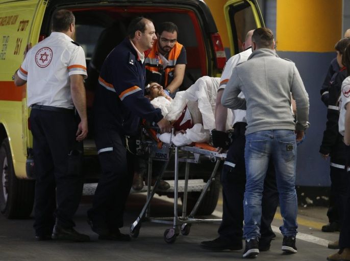 Emergency teams with a wounded Israeli following a stabbing attack, at the Shaare Zedek Medical Center in Jerusalem, Israel, 09 February 2016. Local media reported that Palestinian men stabbed an Israeli, injuring the man, near the Jewish settlement of Neveh Daniel in the Gush Etzion settlements block. Security forces are still searching for the attackers who fled from the scene.