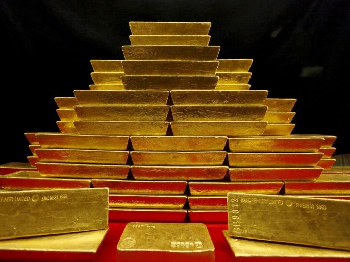 A pile of gold bars is seen in this picture illustration taken at the Czech National Bank in Prague, Czech Republic, in this January 31, 2011 file photo. REUTERS/Petr Josek/Files