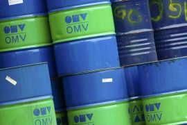 Barrels are pictured at the refinery of Austrian oil and gas group OMV in Schwechat, Austria, October 21, 2015. Oil majors are expected to post the worst set of earnings since the onset of the sector's downturn, with writedowns likely to dominate headlines as companies respond to a further drop in the price of crude in the third quarter. Between October 26 and November 12 the world's top listed oil and gas producers will reveal just how badly they've been hurt by the 17 percent quarter-on-quarter fall in prices. REUTERS/Heinz-Peter Bader