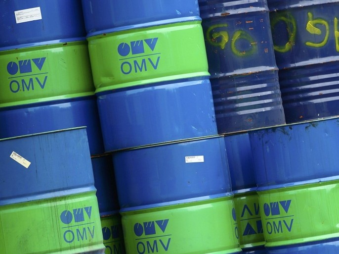 Barrels are pictured at the refinery of Austrian oil and gas group OMV in Schwechat, Austria, October 21, 2015. Oil majors are expected to post the worst set of earnings since the onset of the sector's downturn, with writedowns likely to dominate headlines as companies respond to a further drop in the price of crude in the third quarter. Between October 26 and November 12 the world's top listed oil and gas producers will reveal just how badly they've been hurt by the 17 percent quarter-on-quarter fall in prices. REUTERS/Heinz-Peter Bader