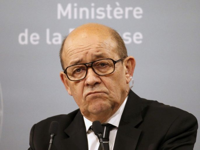 French Defence Minister Jean-Yves Le Drian reacts during a news conference at the French Defence Ministry in Paris, France, January 20, 2016. Defence chiefs from the United States, France, Britain and four other countries met in Paris on Wednesday to examine ways to build on gains made against Islamic State, including increasing the number of police and army trainers. REUTERS/Charles Platiau