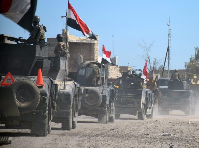 Iraqi military vehicles and troops advance towards the centre of Hasiba district, east of Ramadi city, western Iraq, 10 February 2016. Iraqi forces said on 09 February 2016, they had recaptured the Hasiba alsharqiya zone, east of Ramadi city although some fighting continues east and west of the city. The Iraqi government announced the 'liberation' of Ramadi from Islamic State, marking the first major setback for the al-Qaeda breakaway group since April 2015.