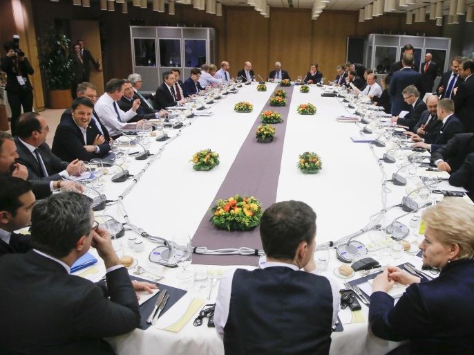 A general view of the round table meeting of EU heads of state and government at an EU summit in Brussels on Friday, Feb. 19, 2016. British Prime Minister David Cameron pushed a summit into overtime Friday after a second day of tense talks with weary European Union leaders unwilling to fully meet his demands for a less intrusive EU. (Olivier Hoslet, Pool Photo via AP)