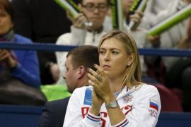 Russia's Maria Sharapova reacts as she watches compatriot Ekaterina Makarova play against Kiki Bertens of the Netherlands during their Fed Cup World Group tennis match in Moscow, February 6, 2016. REUTERS/Grigory Dukor