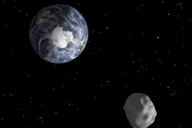 The passage of asteroid 2012 DA14 through the Earth-moon system, is depicted in this handout image from NASA. On February 15, 2013, an asteroid, 150 feet (45 meters) in diameter will pass close, but safely, by Earth. The flyby creates a unique opportunity for researchers to observe and learn more about asteroids. REUTERS/NASA/JPL-Caltech/Handout
