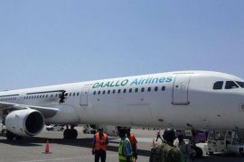 A picture made available 05 February 2016 shows a damaged passenger plane at the airport of Mogadishu, Somalia, 02 February 2016. An explosion that ripped a hole in the side of a Somali passenger plane could have been caused by a bomb, Somali officials said. The explosion occurred on a Daallo Airlines plane 15 minutes after takeoff from Mogadishu on 02 February. The airline said the plane turned back from its route towards Djibouti and landed safely in Mogadishu. EPA/GOOBJOOG NEWS