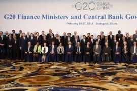 Officials led by host country officials Chinese Finance Minister Lou Jiwei (front 8-L) and People's Bank of China Governor Zhou Xiaochuan (Front 9-L) pose for a family photo of G20 Finance Ministers and Central Bank Governors Meeting at the Pudong Shangri-la Hotel in Shanghai, China, 27 February 2016. Finance officials from G20 member countries are meeting in Shanghai from 26 to 27 February, aiming to formulate reforms for economic growth and strengthen cooperation.