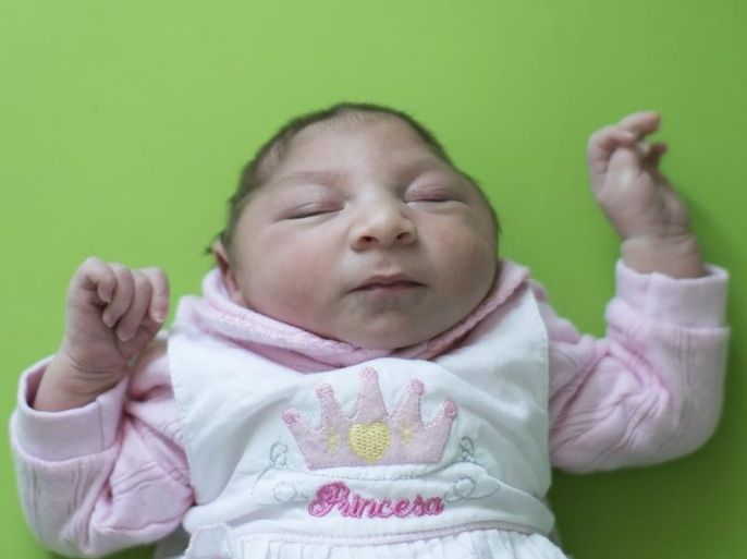 Sophia, who is two weeks old and was born with microcephaly, sleeps before her physical therapy session at the Pedro I hospital in Campina Grande, Paraiba state, Brazil, Friday, Feb. 12, 2016. The Zika virus, spread by the Aedes aegypti mosquito, is suspected to be linked with occurrences of microcephaly in new born babies, but no link has been proven yet. (AP Photo/Felipe Dana)