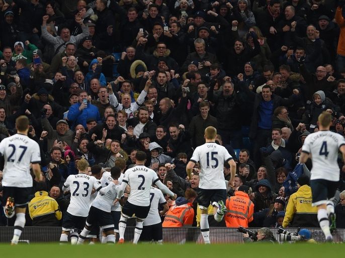 Tottenham Hotspur's Harry Kane (C) celebrates the opening goal in front of the Tottenham fans during the English Premier League soccer match between Manchester City and Tottenham Hotspur at the Etihad Stadium, Manchester, Britain, 14 February 2016. EPA/PETER POWELL EDITORIAL USE ONLY. No use with unauthorized audio, video, data, fixture lists, club/league logos or 'live' services. Online in-match use limited to 75 images, no video emulation. No use in betting, games or single club/league/player publications