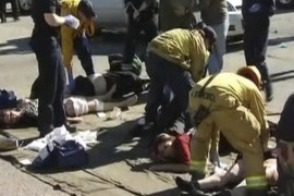 Rescue crews tend to the injured in the intersection outside the Inland Regional Center in San Bernardino, California in this still image taken from video December 2, 2015. At least 20 people were reported injured in an active shooter situation, according to news reports. REUTERS/NBCLA.com/Handout via Reuters NO SALES. FOR EDITORIAL USE ONLY. NOT FOR SALE FOR MARKETING OR ADVERTISING CAMPAIGNS. THIS IMAGE HAS BEEN SUPPLIED BY A THIRD PARTY. IT IS DISTRIBUTED, EXACTLY AS RECEIVED BY REUTERS, AS A SERVICE TO CLIENTS NO RESALES. NO ARCHIVE