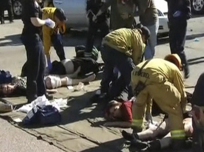 Rescue crews tend to the injured in the intersection outside the Inland Regional Center in San Bernardino, California in this still image taken from video December 2, 2015. At least 20 people were reported injured in an active shooter situation, according to news reports. REUTERS/NBCLA.com/Handout via Reuters NO SALES. FOR EDITORIAL USE ONLY. NOT FOR SALE FOR MARKETING OR ADVERTISING CAMPAIGNS. THIS IMAGE HAS BEEN SUPPLIED BY A THIRD PARTY. IT IS DISTRIBUTED, EXACTLY AS RECEIVED BY REUTERS, AS A SERVICE TO CLIENTS NO RESALES. NO ARCHIVE