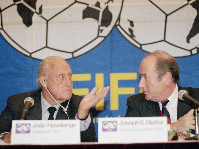 FILE - In this Oct. 27, 1994 file picture Joao Havelange, left, then President of FIFA, and Sepp Blatter, then general secretary, confer during a news conference in New York. FIFA President Sepp Blatter said Tuesday June 2, 2015, that he will resign from his position amid corruption scandal. (AP Photo/ L.M. Otero,File)