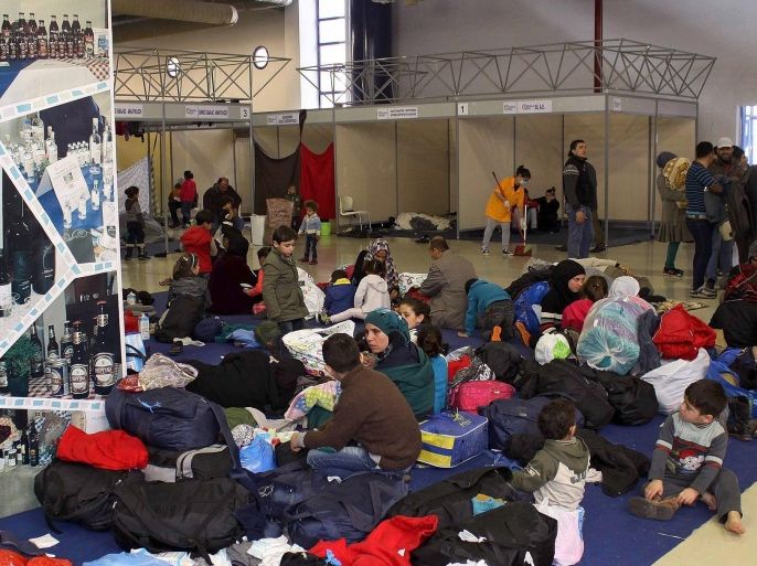 Refugees and migrants rest inside the exhbition centre of Kavala, northeastern Greece, 28 February 2016. The number of refugees currently hosted at the northern Greek city of Kavala has reached 1,500. On 27 February, 900 refugees arrived at the port of Kavala from Mytilene with the ferry Nissos Mykonos. Refugees blocked earlier on 28 February the railway tracks in Idomeni at Greece-Fyrom buffer zone. The refugees sat on the tracks demanding from Fyrom to open the crossing point. According to police, roughly 6,500 refugees are currently hosted at Idomeni camp waiting to cross the border.