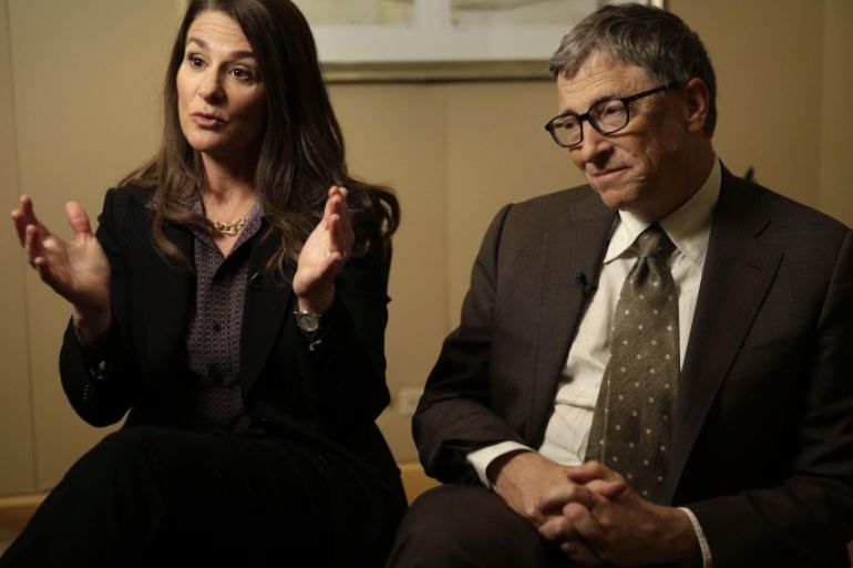 Bill Gates listens while his wife Melinda Gates talks during an interview in New York, Wednesday, Jan. 21, 2015. As the world decides on the most crucial goals for the next 15 years in defeating poverty, disease and hunger, the $42 billion Gates Foundation announces its own ambitious agenda. (AP Photo/Seth Wenig)