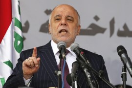 FILE - In this Saturday, Jan. 9, 2016, file photo, Iraq's Prime Minister Haider al-Abadi, speaks during a ceremony marking Police Day at the police academy in Baghdad, Iraq. The Iraqi Prime Minister is dismissing plans to build a wall around the Iraqi capital, according to a statement released by his office Saturday night. The plan for the wall was originally drafted by the Interior Ministry as an effort to prevent Islamic State group attacks inside Baghdad. (AP Photo/Karim Kadim, File)