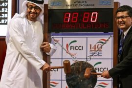 Sheikh Mohamed bin Zayed Al Nahyan (L), Crown Prince of Abu Dhabi and Deputy Supreme Commander of the UAE Armed Forces, and Ashish Kumar Chauhan, Managing Director and Chief Executive Officer, Bombay Stock Exchange (BSE), poses for photograph during the bell ringing ceremony at BSE, in Mumbai, India, 12 February 2016. Crown Prince Nahyan is accompanied by a high-level delegation scheduled to meet top Indian politicians to strengthen political and business ties between the two counties, media reported.