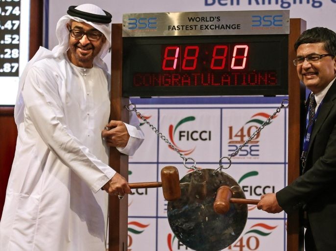 Sheikh Mohamed bin Zayed Al Nahyan (L), Crown Prince of Abu Dhabi and Deputy Supreme Commander of the UAE Armed Forces, and Ashish Kumar Chauhan, Managing Director and Chief Executive Officer, Bombay Stock Exchange (BSE), poses for photograph during the bell ringing ceremony at BSE, in Mumbai, India, 12 February 2016. Crown Prince Nahyan is accompanied by a high-level delegation scheduled to meet top Indian politicians to strengthen political and business ties between the two counties, media reported.
