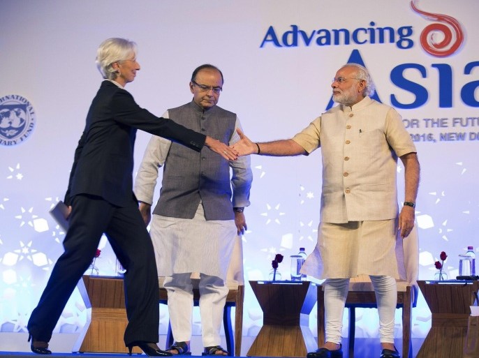 International Monetary Fund Managing Director Christine Lagarde (L) shakes hands with Prime Minister of India Narendra Modi (C) and Indiaâs Finance Minister Arun Jaitley (C) after her opeing remarks at the 'Advancing Asia, Investing for the Future' conference watched by Prime Minister of India Narendra Modi (C) and Indiaâs Finance Minister Arun Jaitley (R) at the Taj Palace Hotel in New Delhi, India, 12 March 2016. The three-days conference is held from 11 to 13 March.