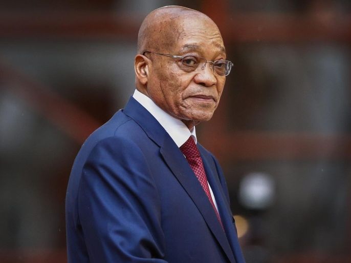 (FILE) A file picture dated 12 February 2015 shows South African President Jacob Zuma arriving for the opening of parliament to deliver his State Of The Nation Address in Cape Town, South Africa. The South African Constitutional Court ruled on 31 March 2016 that Zuma failed to uphold the constitution upon failing to repay taxpayer money that was spend to renovate his private home. South African opposition Democratic Allicance (DA) leader Mmusai Maimane called for Zuma's impeachment in parliament.