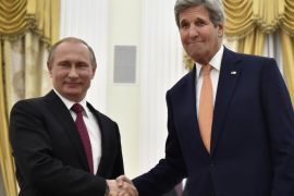 U.S. Secretary of State John Kerry, right, shakes hands with Russian President Vladimir Putin at the Kremlin in Moscow, Russia, Thursday, March 24, 2016. Kerry on Thursday voiced hope that Washington and Moscow could narrow their differences on Syria and Ukraine as he sat down for talks with Russian President Vladimir Putin.(Alexander Nemenov/Pool Photo via AP)