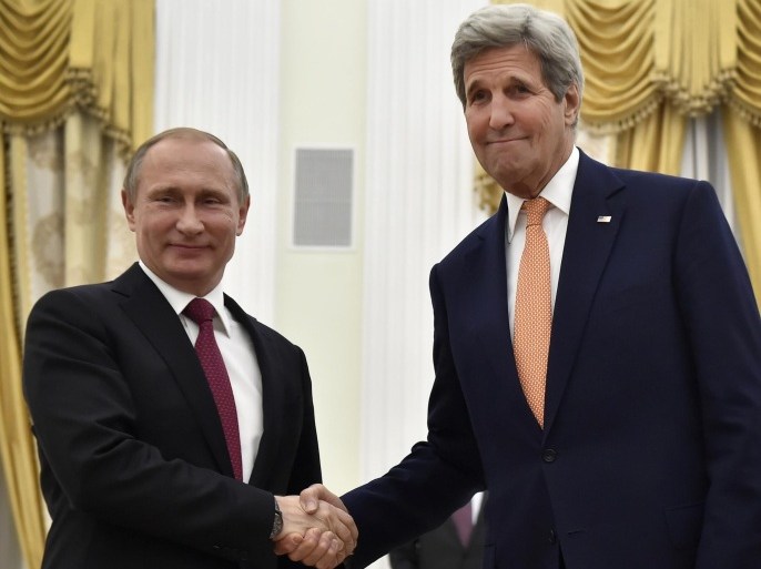 U.S. Secretary of State John Kerry, right, shakes hands with Russian President Vladimir Putin at the Kremlin in Moscow, Russia, Thursday, March 24, 2016. Kerry on Thursday voiced hope that Washington and Moscow could narrow their differences on Syria and Ukraine as he sat down for talks with Russian President Vladimir Putin.(Alexander Nemenov/Pool Photo via AP)