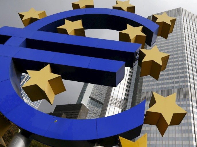 The euro logo sculpture stands in front of the headquarters of the European Central Bank (ECB) in Frankfurt in this October 26, 2014 file photo. The European Central Bank cut interest rates on Thursday to boost the euro zone economy, surprising financial markets by dropping its main refinancing rate to zero from 0.05 percent. It also expanded its quantitative easing asset-buying programme to 80 billion euros a month from 60 billion euros and cut its deposit rate to -0.4 percent from -0.3 percent, charging banks more to keep their money with the ECB. REUTERS/Ralph Orlowski/Files