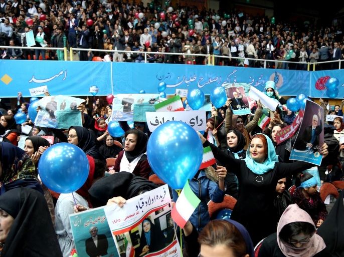 Iranians attend a campaign rally for reformists candidates in the upcoming parliamentary elections, in Tehran, Iran, Saturday, Feb. 20, 2016. Iran will hold the elections of the 290-seat parliament and 88-member Assembly of Experts clerical body on Friday, Feb. 26. Reformist and moderate candidates have formed an alliance, hoping to challenge conservative lawmakers, who currently hold a majority in parliament. (AP Photo/Ebrahim Noroozi)