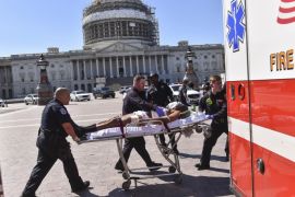 EDS NOTE: The suspect's face was digitally altered by the Washington Post at the request of the Washington D.C. Fire and EMS Department. First responders transport the person believed to be the suspect in a shooting at the U.S. Capitol complex Monday, March 28, 2016, in Washington. Visitors and staff were shut in their offices and told to "shelter in place." The shooting unfolded with Congress on recess and lawmakers back in their districts. (Ricky Carioti/The Washington Post via AP) WASHINGTON TIMES OUT; NEW YORK TIMES OUT;THE WASHINGTON EXAMINER AND USA TODAY OUT; MAGS OUT; NO SALES; MANDATORY CREDIT