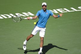 Novak Djokovic from Serbia in action against Milos Raonic from Canada during their final match at the BNP Paribas Open tennis tournament in Indian Wells, California, USA, 20 March 2016.