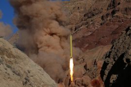 FILE -- In this Wednesday, March 9, 2016 file photo obtained from the Iranian Fars News Agency, a Qadr H long-range ballistic surface-to-surface missile is fired by Iran's powerful Revolutionary Guard, during a maneuver, in an undisclosed location in Iran. On Sunday, March 13, 2016 Israeli Prime Minister Benjamin Netanyahu called on world powers to punish Iran after the country test-fired two ballistic missiles emblazoned with the phrase “Israel must be wiped out” in Hebrew. (AP Photo/Fars News Agency, Omid Vahabzadeh)