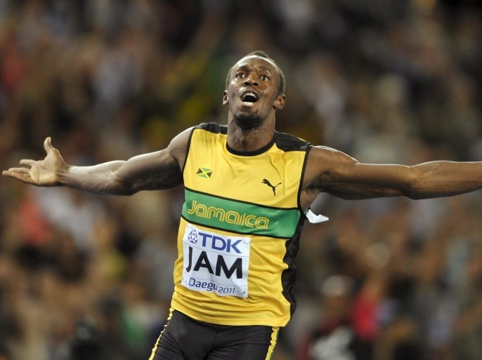 Usain Bolt of Jamaica celebrates winning the men's 4x100 metres relay final at the IAAF World Championships in Daegu in this file picture taken September 4, 2011. Six-times Olympic champion Bolt said he felt shocked and let down by the scandal-hit IAAF, but the Jamaican sprinter was against resetting athletics world records as the sport attempts to move on from the doping crisis. REUTERS/Dylan Martinez/Files